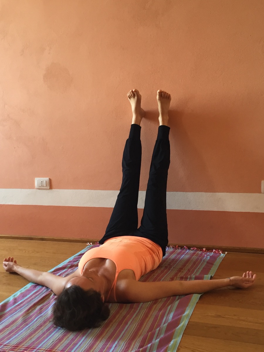 Yoga position legs on wall